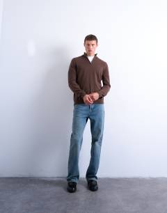 Model wearing Essential 1/4 zip funnel with wool in brown