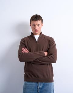 Model wearing Essential 1/4 zip funnel with wool in brown