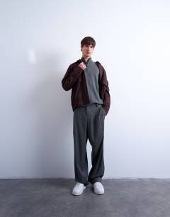 Model wearing Essential 1/4 zip funnel with wool in charcoal