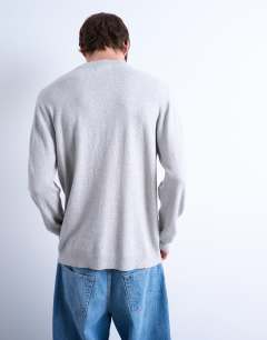 Model wearing Essential crew neck with wool in light grey