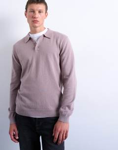 Model wearing Essential knitted button polo in dusty mauve
