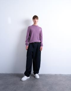 Model wearing Essential knitted crew neck in purple