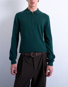 Model wearing Essential knitted zip polo in dark green