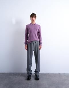 Model wearing Essential knitted zip polo in purple