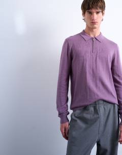 Model wearing Essential knitted zip polo in purple