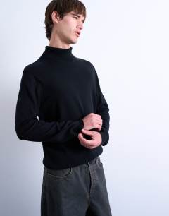 Model wearing Essential roll neck with wool in black