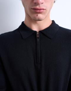 Model wearing Essential zip polo with wool in black