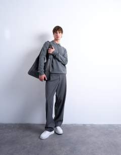 Model wearing Essential zip polo with wool in charcoal