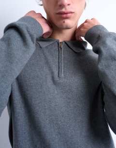 Model wearing Essential zip polo with wool in charcoal