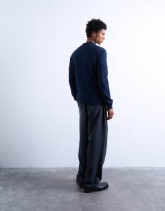 Model wearing Essential zip polo with wool in navy