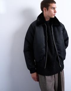 Model wearing Faux fur collar bomber jacket in black