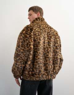 Model wearing Faux fur leapord print bomber jacket in brown