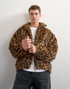 Model wearing Faux fur leapord print bomber jacket in brown
