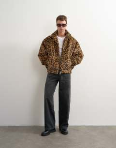 Model wearing Faux fur leapord print bomber jacket in brown