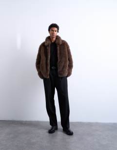 Model wearing Faux fur zip through coat in brown