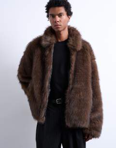Model wearing Faux fur zip through coat in brown