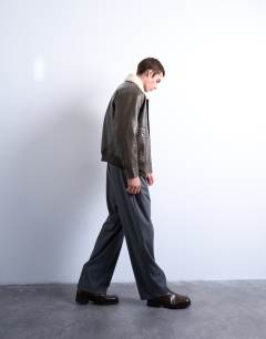 Model wearing Faux leather borg collar washed jacket in chocolate