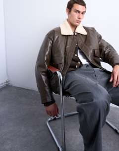 Model wearing Faux leather borg collar washed jacket in chocolate
