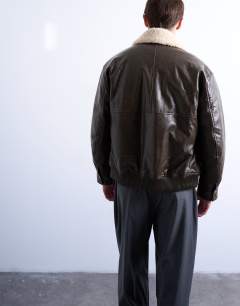 Model wearing Faux leather borg collar washed jacket in chocolate