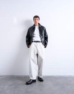 Model wearing Faux leather harrington jacket in black