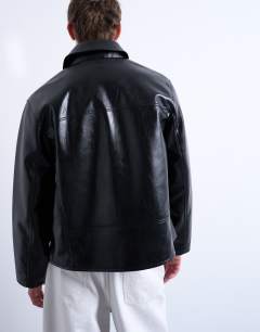 Model wearing Faux leather harrington jacket in black