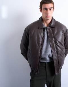 Model wearing Faux leather puffer jacket in chocolate