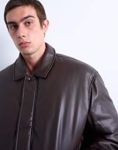 Model wearing Faux leather puffer jacket in chocolate