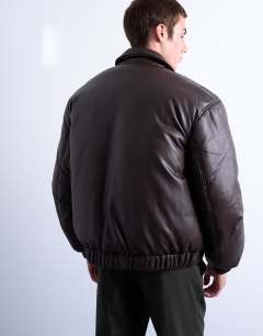 Model wearing Faux leather puffer jacket in chocolate