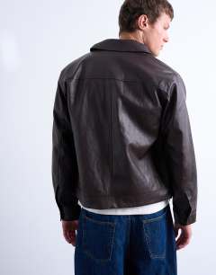 Model wearing Faux leather smart jacket in burgundy