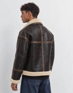 Model wearing Faux shearling jacket in espresso brown