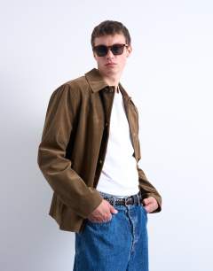 Model wearing Faux suede button jacket in brown