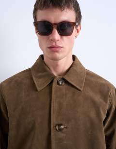 Model wearing Faux suede button jacket in brown