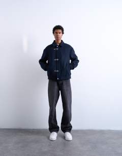 Model wearing Fireman clasp wool blend jacket in navy