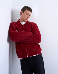 Model wearing Fluffy knit cardigan in burgundy