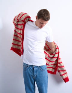 Model wearing Fluffy stripe crew cardigan red