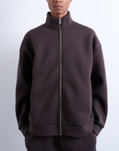 Model wearing Funnel neck zip through panel sweatshirt in brown