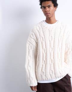 Hand knit cable jumper in ecru