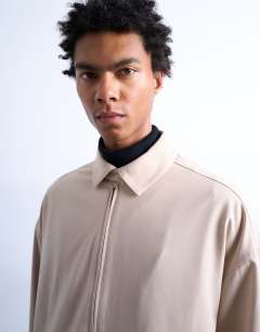 Model wearing Harrington jacket in stone