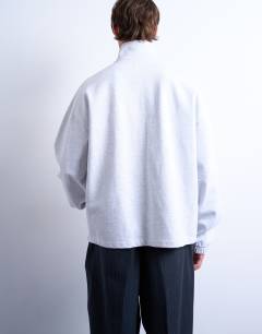 Model wearing Heavyweight boxy fit zip through funnel neck sweatshirt in light grey marl