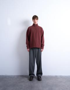Model wearing Heavyweight oversized fit 1/4 zip in brown