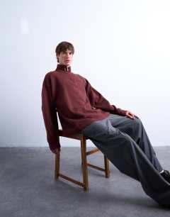 Model wearing Heavyweight oversized fit 1/4 zip in brown