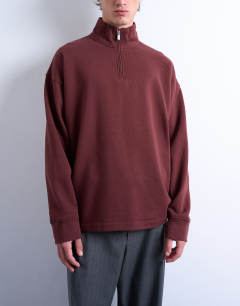 Model wearing Heavyweight oversized fit 1/4 zip in brown