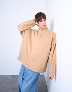 Model wearing Heavyweight oversized fit 1/4 zip in dark stone