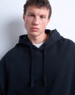 Model wearing Heavyweight oversized fit hoodie in black