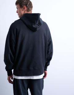 Model wearing Heavyweight oversized fit hoodie in black