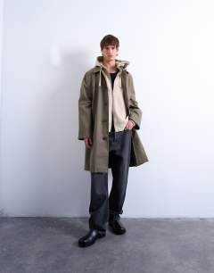 Model wearing Heavyweight oversized fit zip through hoodie in light stone