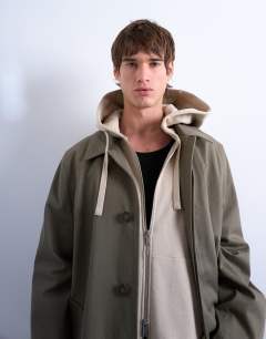 Model wearing Heavyweight oversized fit zip through hoodie in light stone