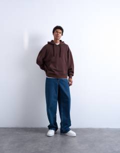 Model wearing Heavyweight oversized hoodie in brown