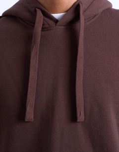 Model wearing Heavyweight oversized hoodie in brown
