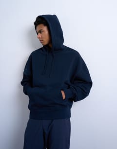 Model wearing Heavyweight oversized hoodie in navy